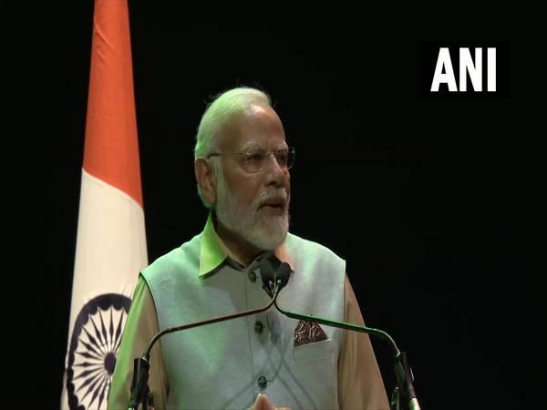 PM Modi addresses the Indian community at LA Seine Musicale in Paris (Photo/ANI)