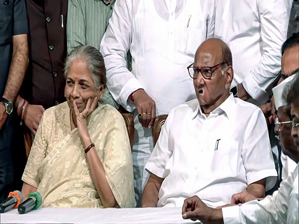 Sharad Pawar with his wife Pratibha Pawar (File Photo/ANI)