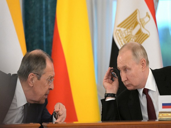 Russia's President Vladimir Putin (right) and Foreign Minister Sergey Lavrov (left). (Photo Credit: Reuters)