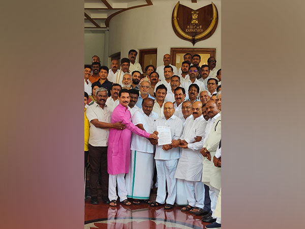 Opposition party leaders in Karnataka meet Governor Gehlot. (Photo/ANI)