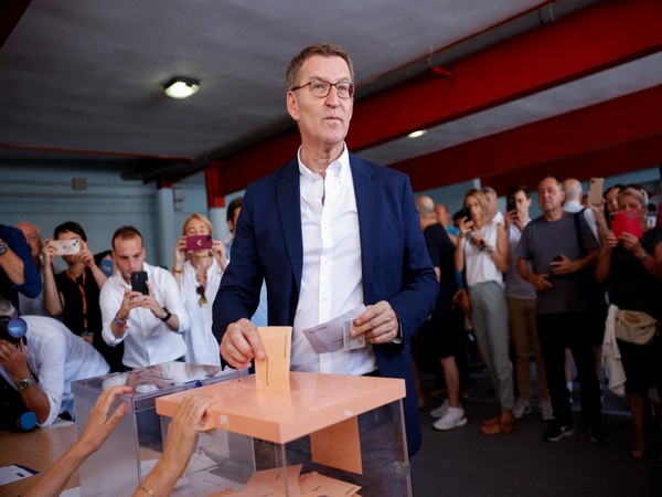 Spain's opposition Popular Party's (PP) Alberto Nunez Feijoo cast his vote during the snap general elections in Madrid, Spain. (Photo Credit: Reuters)