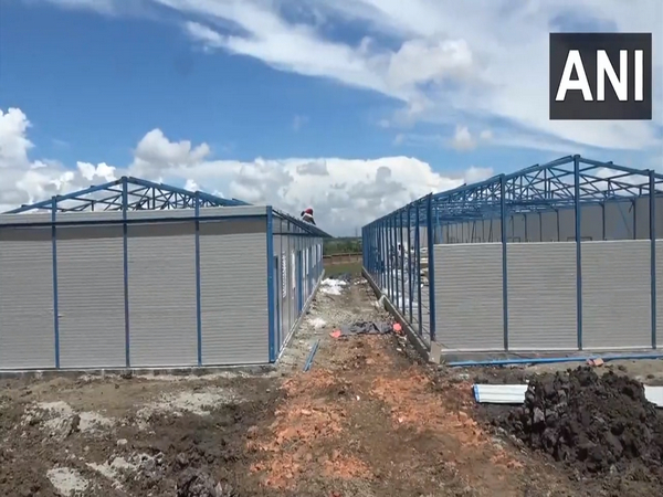 Temporary shelter homes under construction in Thoubal district. (Photo/ANI)