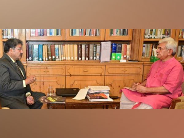 KWFF founder and director Mushtaaque Ali Ahmad Khan with J-K LG Manoj Sinha (Photo/ANI)