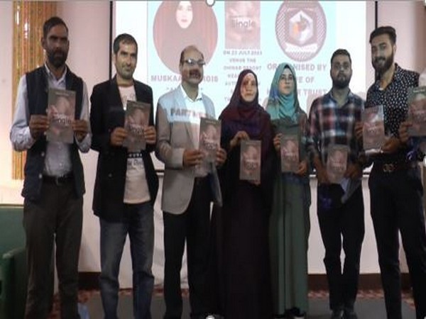 Muskan Nargis, a young kashmiri writer unveiling her debut book at an event in Srinagar (Photo/ANI)