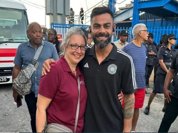 Virat Kohli with Caroline Da Silva (Source: BCCI)