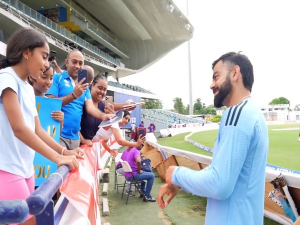 Virat Kohli with fans (Photo: BCCI)