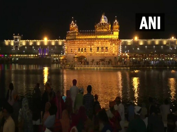 Devotees queue up in large numbers to celebrate, take a holy dip in the Golden Temple Sarovar on the occasion of the birth anniversary of Guru Ram Das (File Photo/ANI)