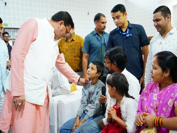 Uttarakhand Chief Minister Pushkar Singh Dhami interacting with 'SVAnidhi' beneficiaries (Photo/ANI)