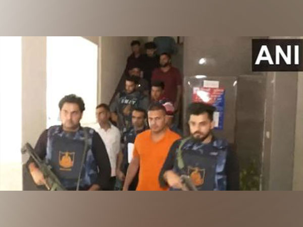 Sachin Bishnoi being brought down by Delhi Police special cell (Photo/ANI)  