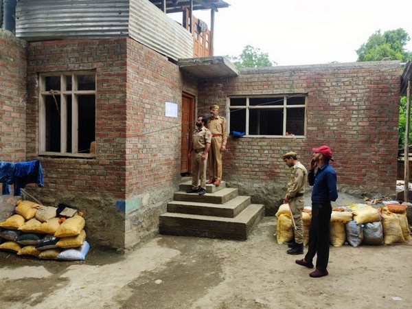 Police attaches under-construction house of drug smuggler in Baramulla (Photo/ANI)