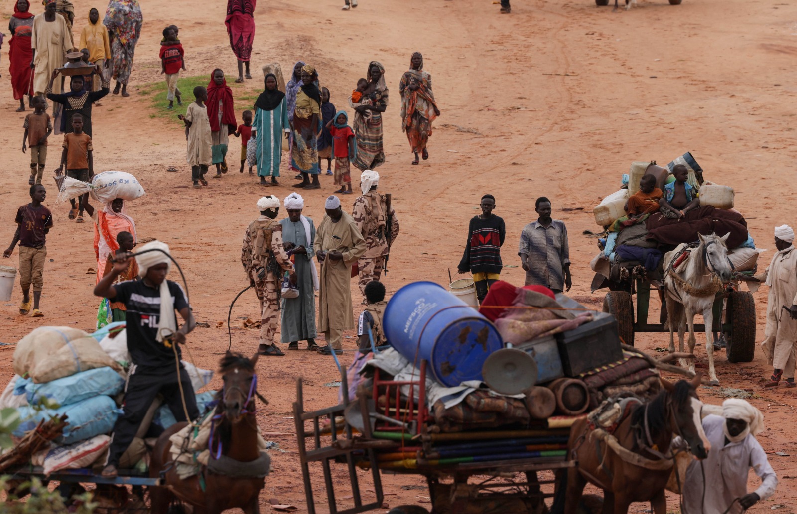 Sudanese people who fled the conflict cross border between Sudan and Chad. (Photo/Reuters)