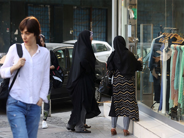 Iranian women walk on a street during the revival of morality police in Tehran, Iran, July 16, 2023. (File Photo/Reuters)