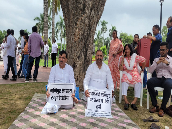 AAP MPs Sanjay Singh and Sushil Kumar Rinku protesting on parliament premises seeking discussion on Manipur (Photo/ANI)