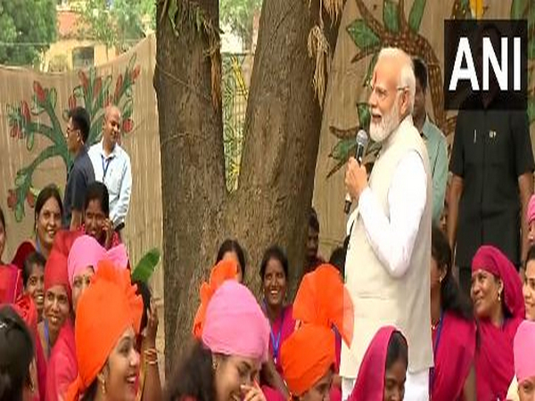 Prime Minister Narendra Modi while interacting with leaders of tribal community in Madhya Pradesh recently (File Photo/ANI)