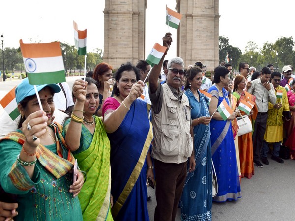 Guests invited by PM Narendra Modi from different parts of India visit India Gate (Photo/ANI)