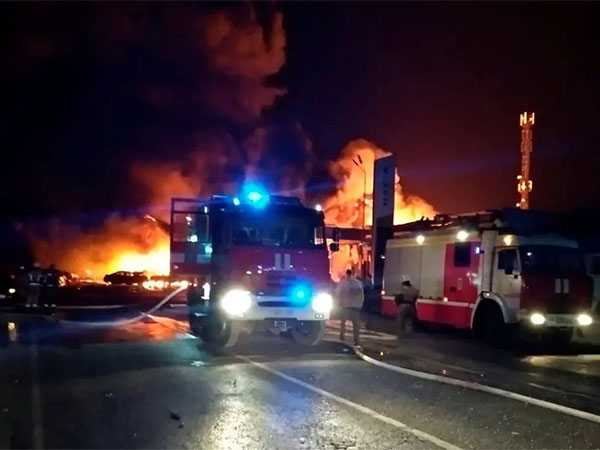 Emergency responders at the scene of the fire in Russia's Makhachkala (Image Credit: Reuters)