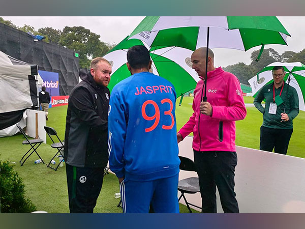 India captain Jasprit Bumrah and Ireland captain Paul Stirling shake hands after umpires call off match (Image: BCCI Twitter)