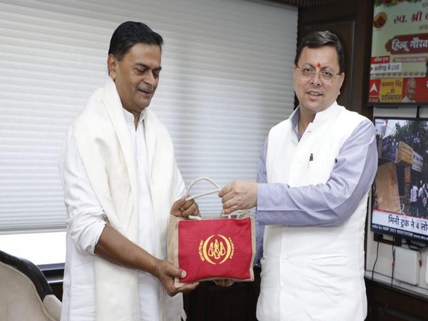Uttarakhand Chief Minister Pushkar Singh Dhami meets Union Energy Minister RK Singh (Photo/ANI)