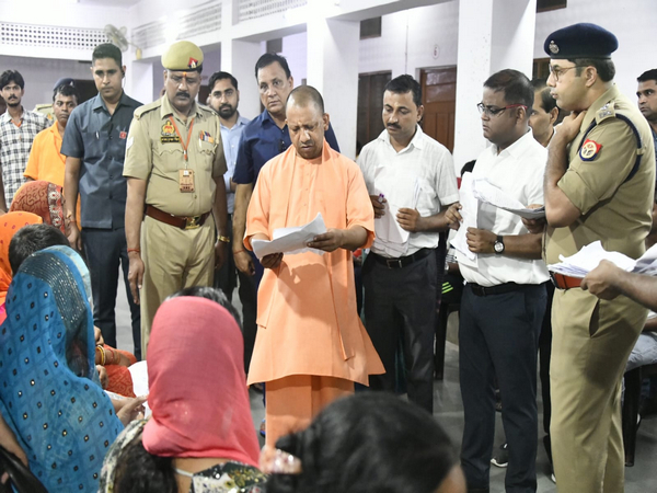 CM Yogi Adityanath listening to people at Janata Darshan (Photo/UP Government) 