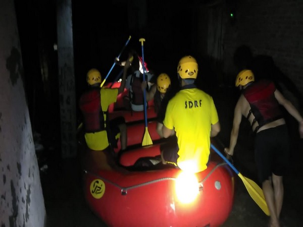 SDRF rescue and relief operation in Udham Singh Nagar waterlogged locality (Image/ANI)
