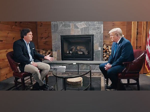 US former President Donald Trump with former Fox News host Tucker Carlson (Screengrab from Carlson's tweet)