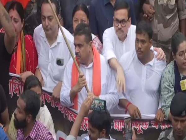 West Bengal Leader of Opposition Suvendu Adhikari takes part in protest march (Photo/ANI)