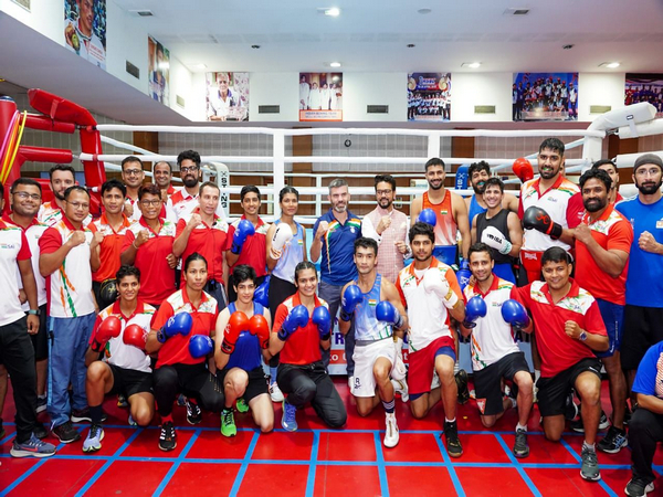 Sports Minister Anurag Thakur with boxers going to participate in Asian Games (Image: SAI media)