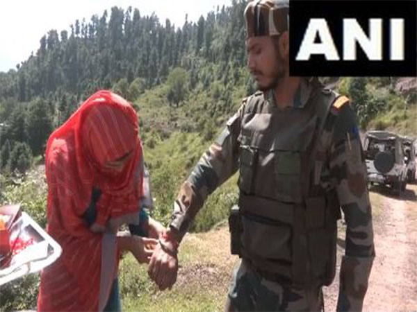 Local women in J-k's Baramulla celebrate Raksha Bandhan with soldiers (Photo/ANI)