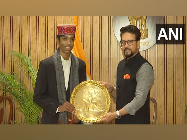 Union Sports Minister Anurag Thakur felicitates Praggnanandhaa (Image: ANI)