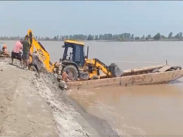 JCB safely brought home after being left stranded for two months owing to floods in Ferozepur. (Photo/ANI)