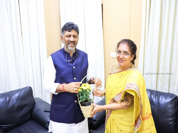 Karnataka Deputy CM DK Shivakumar with BJP leader Tejaswini (Photo Courtesy: DKShivakumar/X)