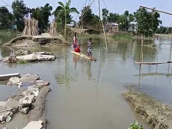 Assam floods damage roads in Barpeta district, residents stranded (Photo/ANI)