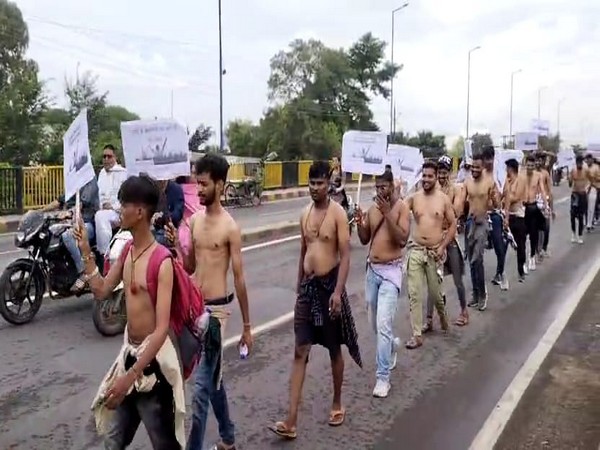 Candidates marching towards Indore collectorate (Photo/ANI)