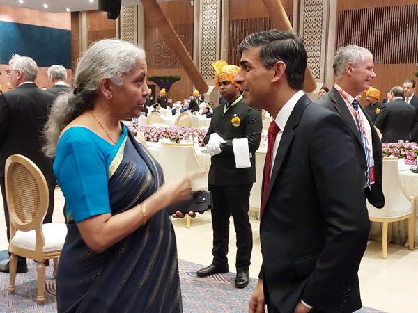 Union Finance Minister Nirmala Sitharaman on Saturday exchanged pleasantries with United Kingdom Prime Minister Rishi Sunak (Photo/ANI)
