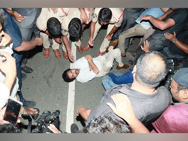 JSP chief Pawan Kalyan lies down on road in protest. (Photo/ANI)