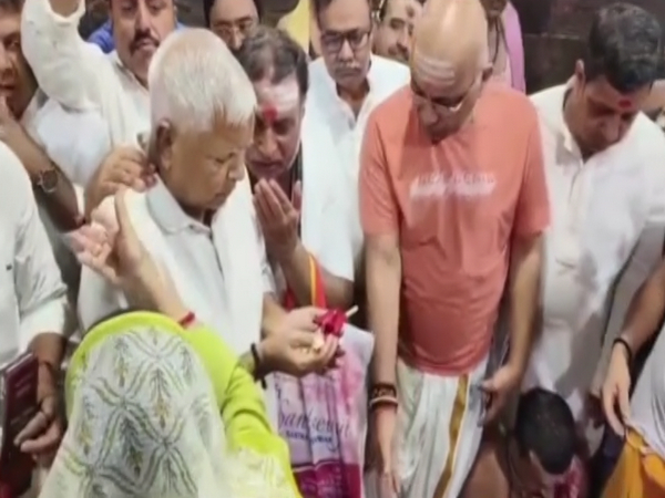 RJD Chief Lalu Prasad Yadav with Rabri Devi (Photo/ANI)