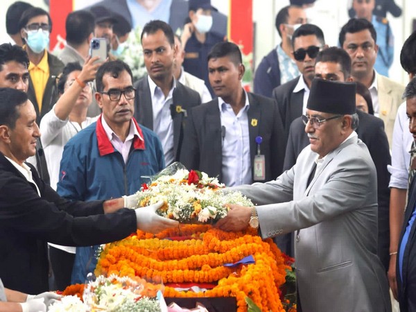 Nepal PM Pushpa Kamal Dahal paying tribute to tribute to Subash Chandra Nembwang (Photo: Nepal PM Secretariat)