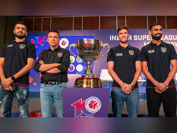 Odisha FC players and staff with the trophy. (Photo- ISL)