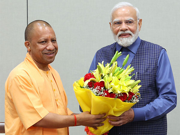 Prime Minister Narendra Modi with UP CM Yogi Adityanath  (File Photo/ANI)