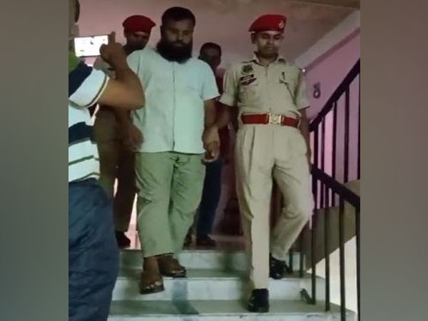 Accused being taken to court (Photo credit/Assam Police)