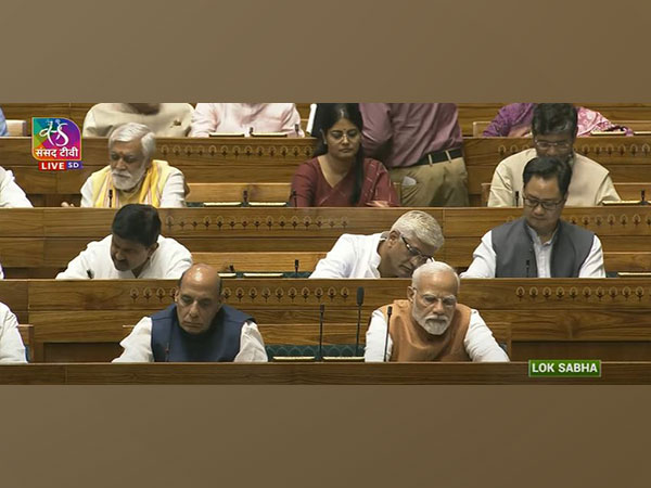 Prime Minister Narendra Modi, Defence Minister Rajnath Singh and members of BJP and NDA in Lok Sabha on Wednesday  (Photo/Sansad TV)