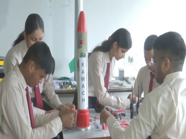 Students with the Kavach missile prototype (Photo/ANI)