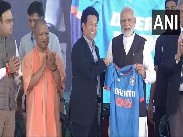 Sachin Tendulkar gifts Indian cricket team jersey to PM Modi (Photo: ANI)