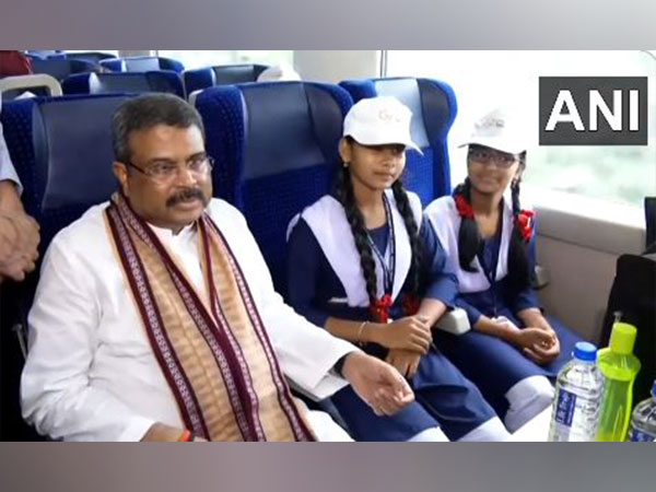 Dharmendra Pradhan with students onboard newly inaugurated Vande Bharat (Photo/ANI)
