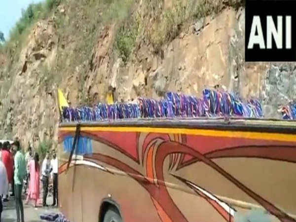 Private bus hits rock on slope near in Gujarat’s Banaskantha (Photo/ANI)