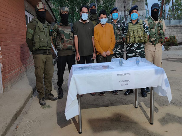 Arrested terrorists with security personnel (Photo/ANI)