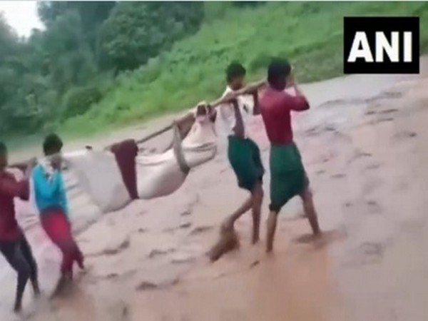 The woman was transported to hospital while wrapped in a cloth. (Photo/ANI)