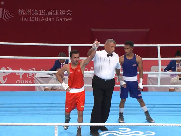 Boxer Deepak (in red) after the bout (Image: Twitter/ SAI) 