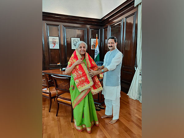 Badrinath-Kedarnath Temple Committee chairman Ajendra Ajay with Finance Minister Sitharaman (Photo/ANI)