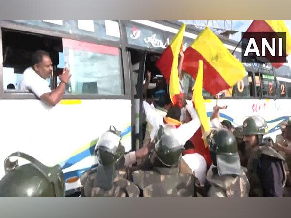 Visuals from protests near Attibele, Karnataka. (Photo/ANI)